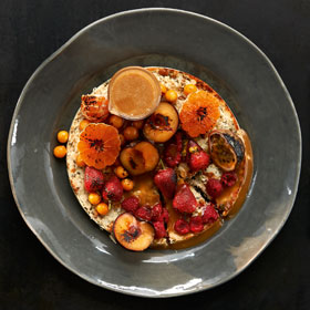 Baked feta cheesecake with hazelnuts, fruit and caramel