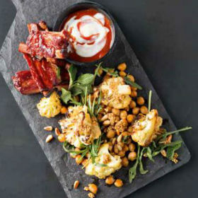 Sriracha roasted chickpea and cauliflower salad with pickled mustard seeds