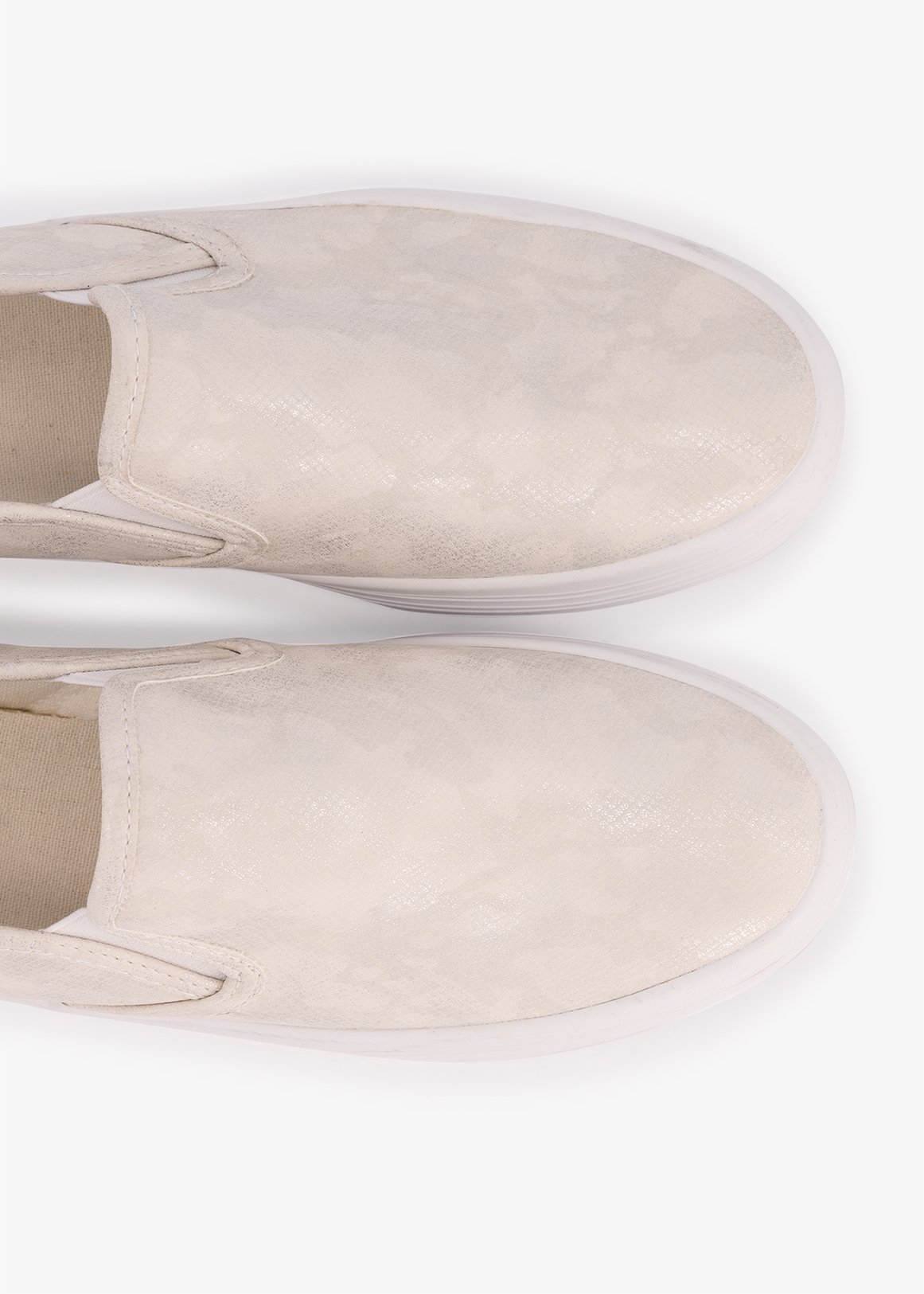 white vans slip on platform