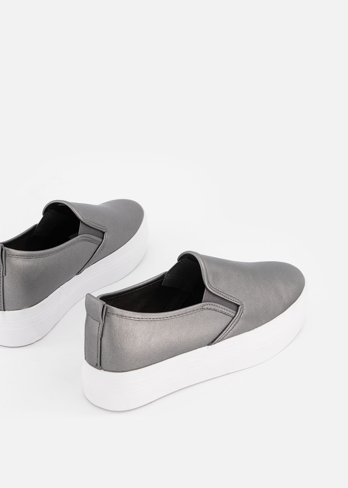 white platform slip on