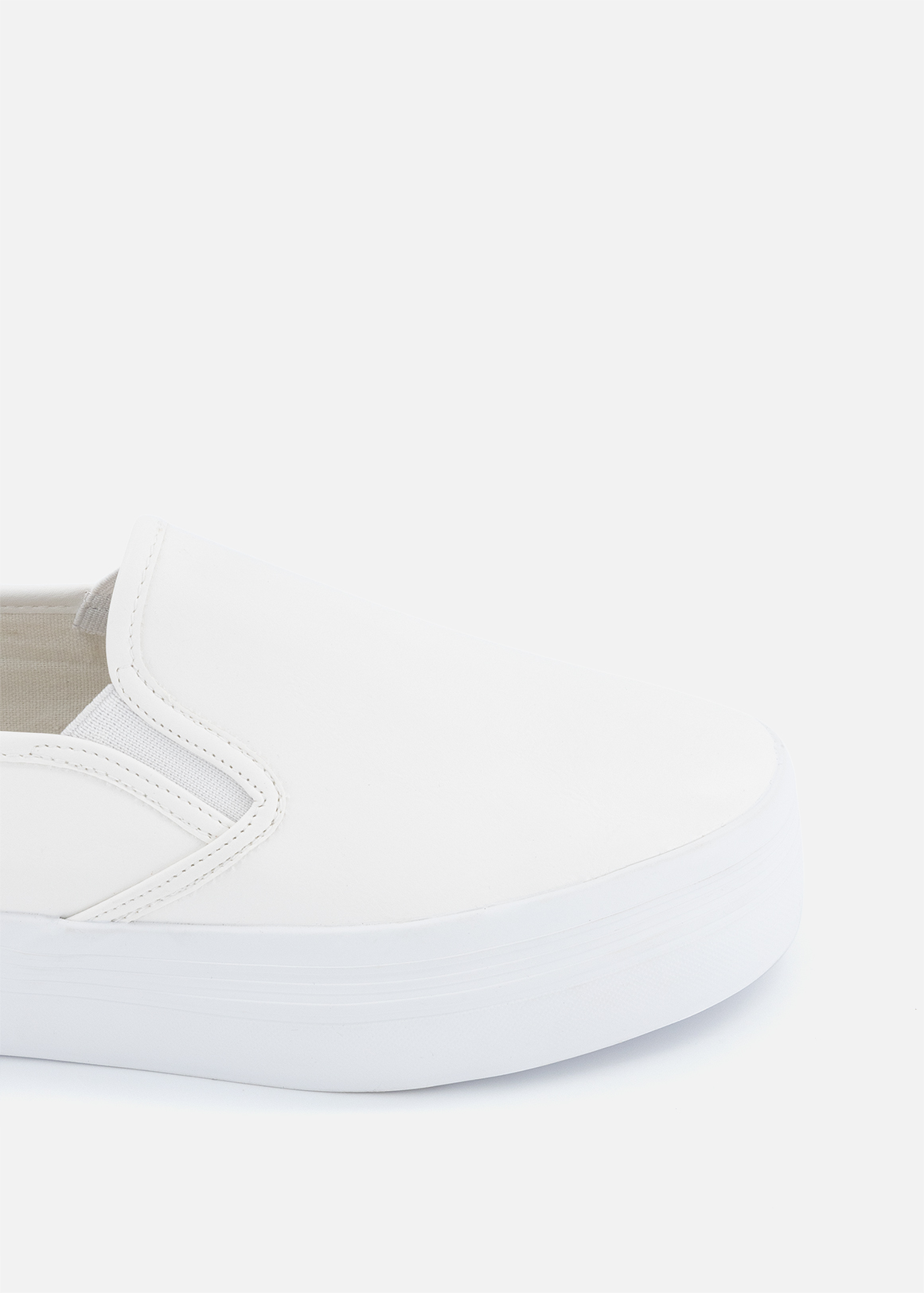 white platform slip on
