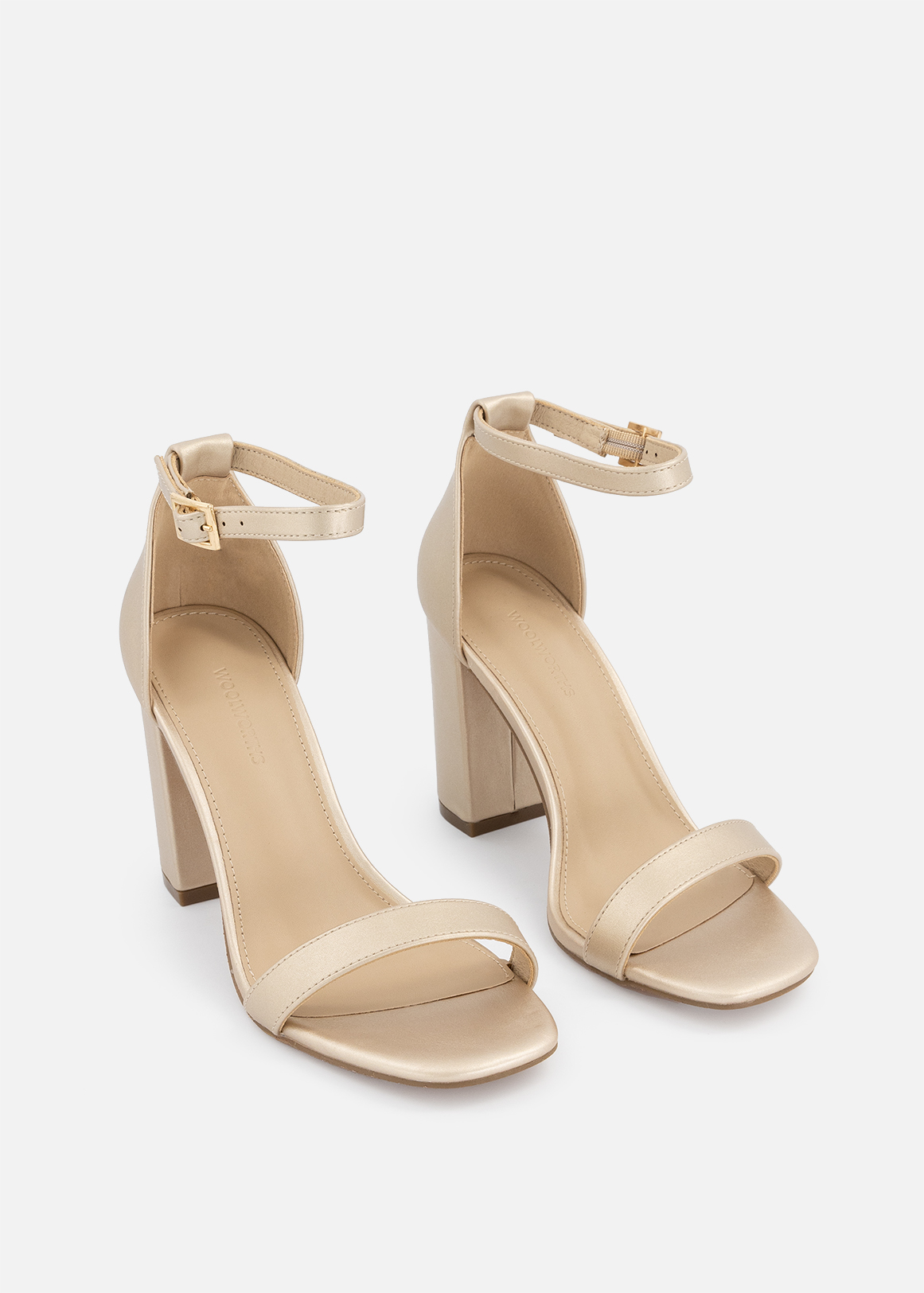 black shoes with gold block heels