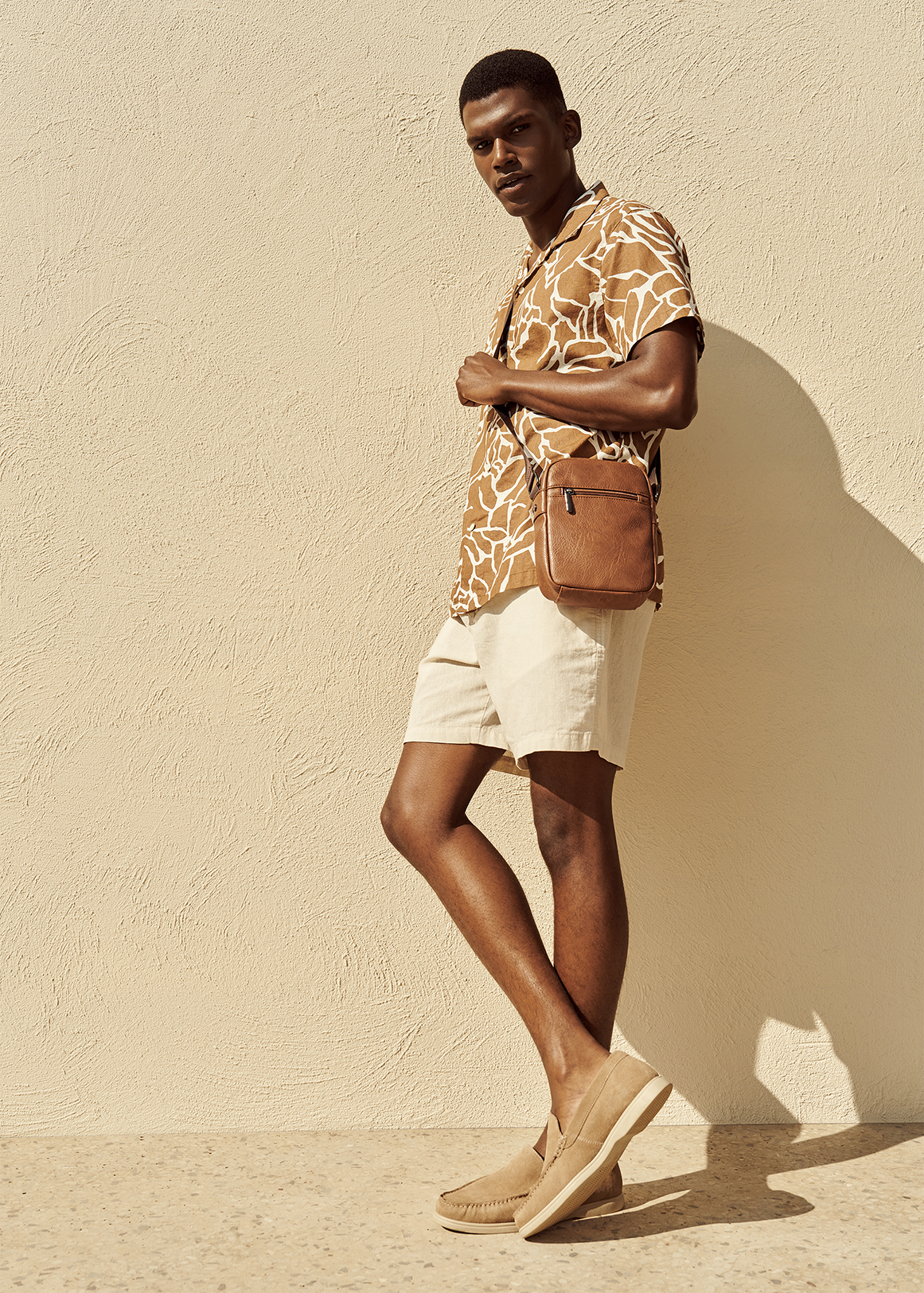 Zipped Faux Leather Crossbody Bag | Woolworths.co.za